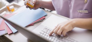 Nursing - Mixing Bottles of Medication